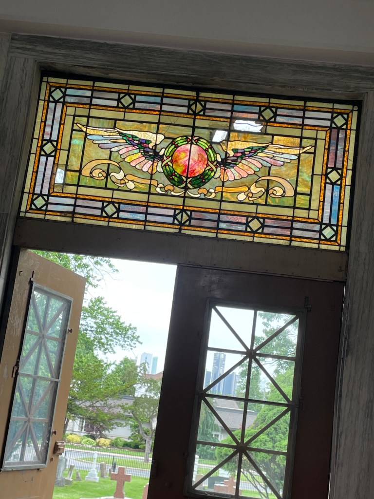 Stained glass above door in Windsor Grove Cemetery mausoleum